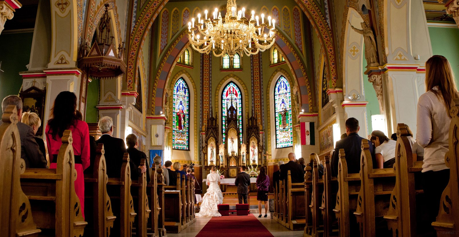 A breathtaking Christian church interior during a wedding ceremony.